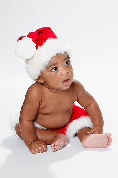 istock Sitting baby Santa 152503371