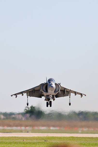 istock Harrier Jump Jet hovers over tarmac 152503666