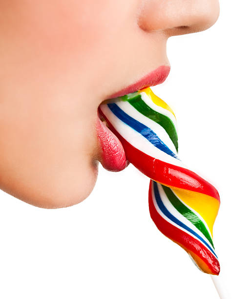 istock closeup cute woman with candy 152504025