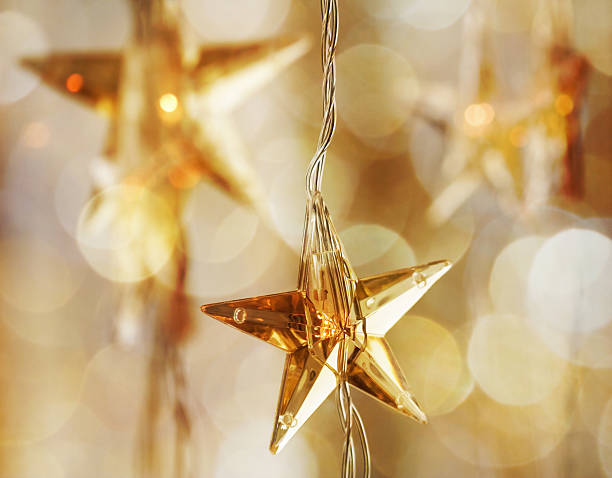istock Hanging golden stars for Christmas 152505486