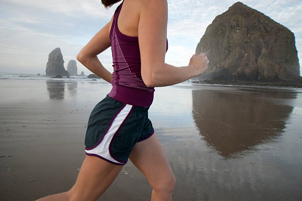 woman jogging stock photo