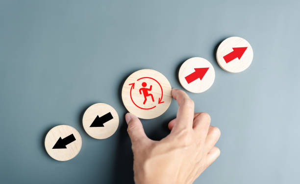 istock Businessperson following Red arrow and different direction facing opposite direction with black arrow for business disruption and technology transformation and different thinking idea concept. 1525057701