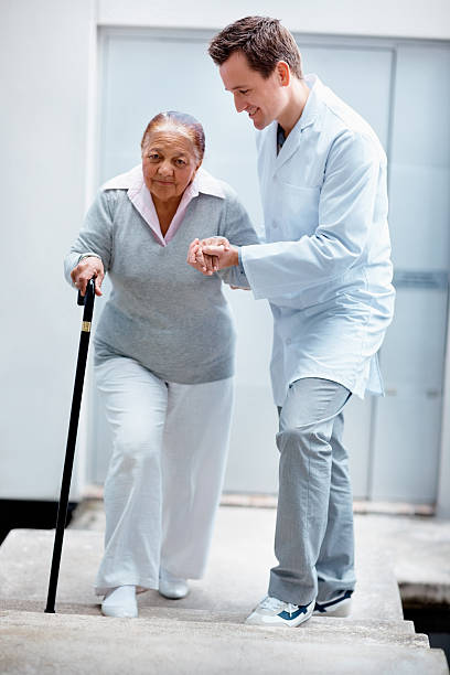 istock Happy doctor assisting his patient while walking 152505802