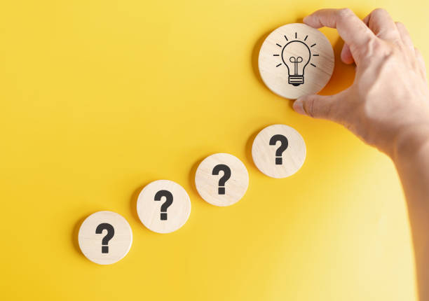 istock Hand hold wood block to smart creativity light bulb which among question icon. smart, creative, idea thinking to innovation brainstorm and imagination learning educate solution concept. 1525058227