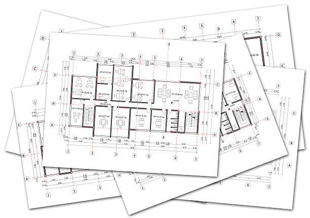 Stack of architectural plans stock photo