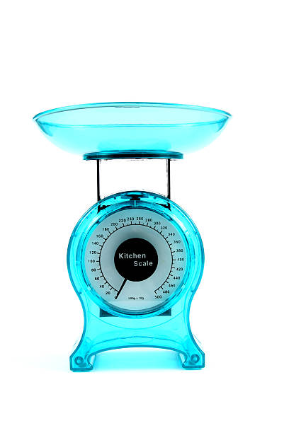 Bright blue kitchen scale isolated stock photo