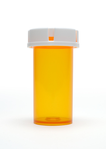 Pill bottle isolated on white background