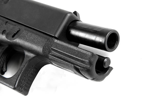 istock Macro photo of .40 caliber handgun barrel 152507249