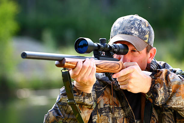 istock Closeup of hunter ready to aim at animal 152507277