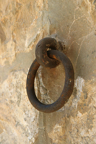 istock rusty metal ring on the rock 152509046