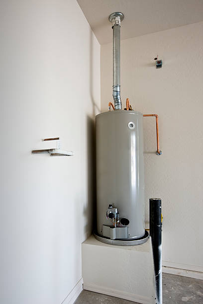 istock A grey hot water tank mounted on a box platform 152509531