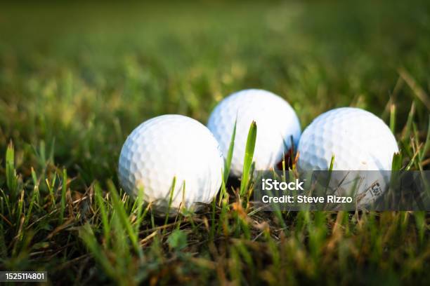Three Golf Balls On Grass Stock Photo - Download Image Now - Canada, Color Image, Copy Space