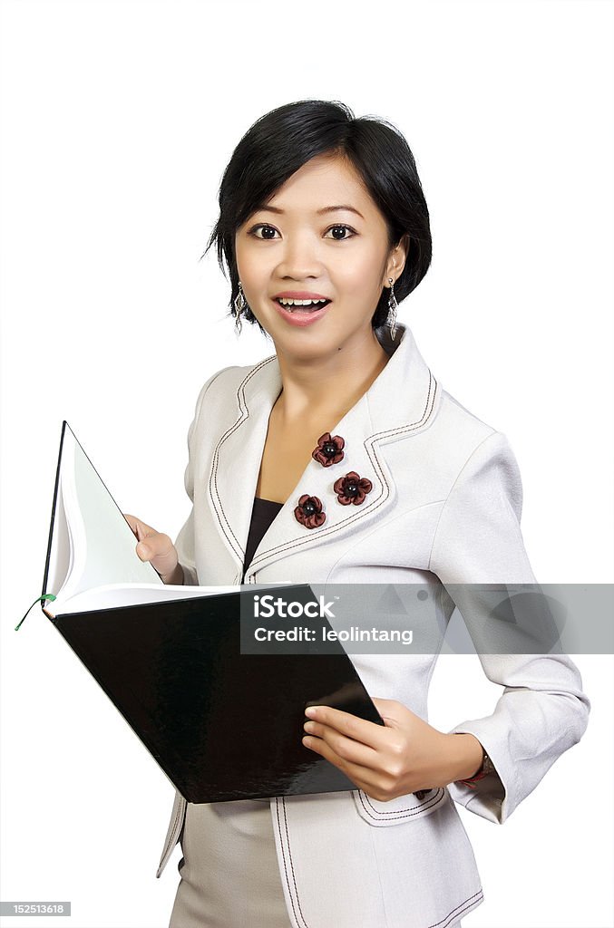 Mujer de negocios mirando en el libro de choque - Foto de stock de Adulto libre de derechos
