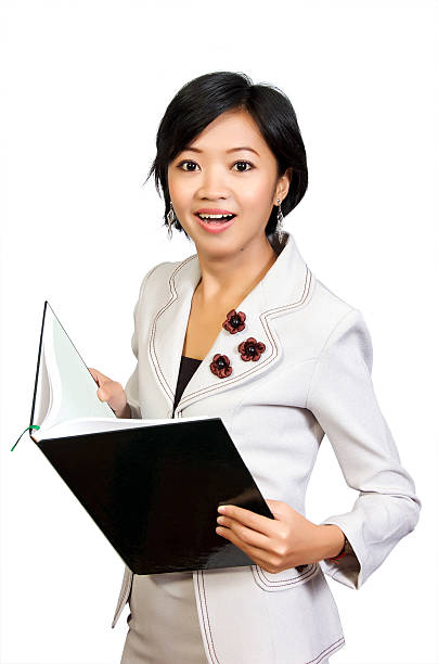 istock Business Woman Shock Looking at the Book 152513618