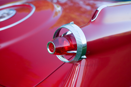 Close-Up of an old red Cadillac.