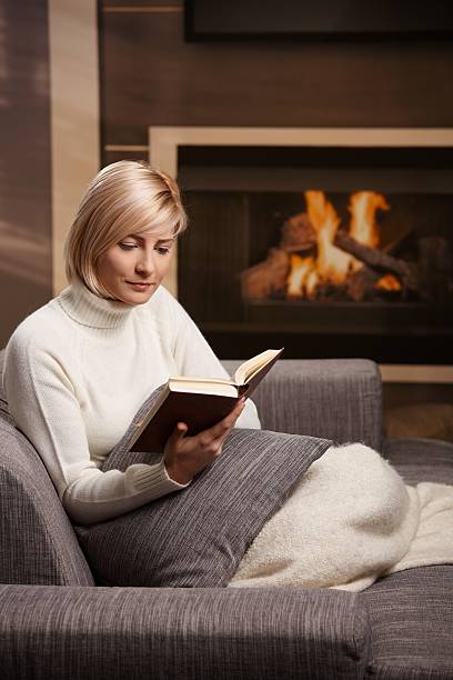 istock Woman reading at home 152513932