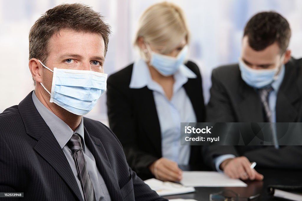 Geschäftsleute fearing h1n1-virus - Lizenzfrei Schutzmaske Stock-Foto