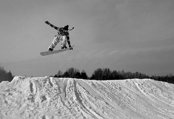 snowboarder in the air stock photo