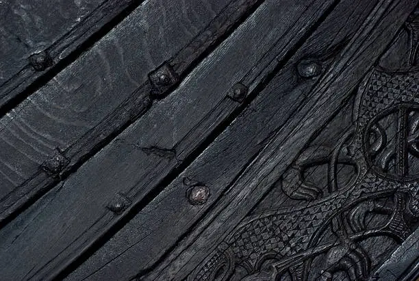 Detail of old, Norwegian viking ship, the Oseberg ship, built in Norway in year 820, now on display at the Viking Ship Museum in Oslo, Norway.