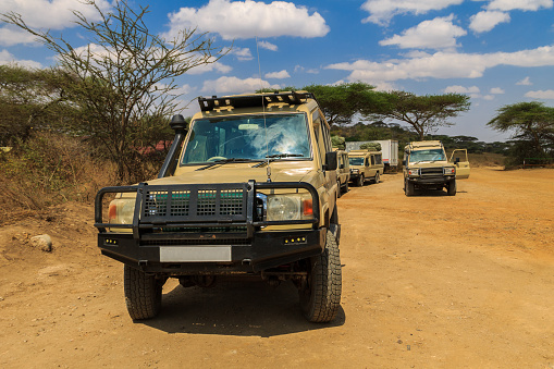 Serengeti, Tanzania -September 10, 2021: SUV cars parking in Serengeti national park, Tanzania