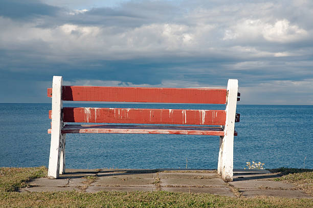 istock Red bench in Sainte Anne des Monts 152515738