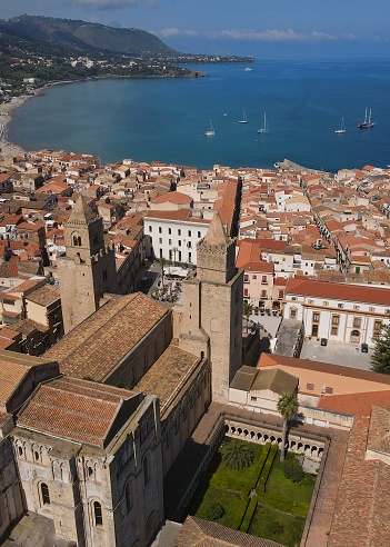 Drone shot over Cefalù cathedral, Sicily, Italy