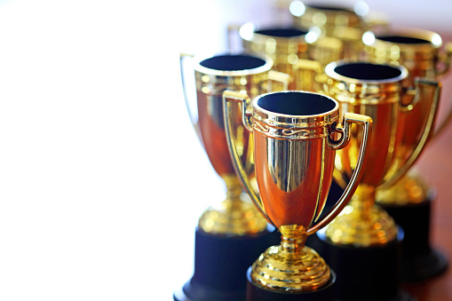 A group of trophies photograped with a very shallow depth of field.