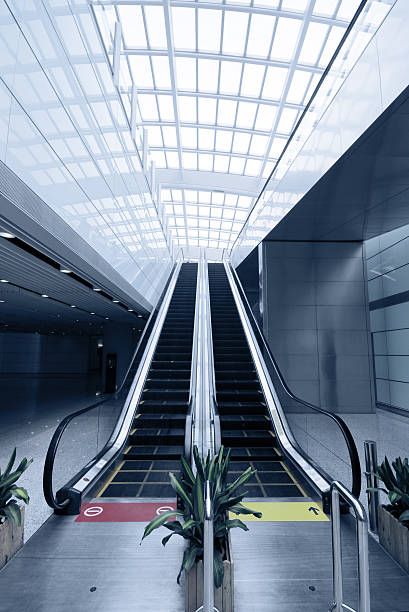 Escalator in Modern Building stock photo