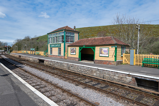 Corfe.Dorset.United Kingdom.April 17th 2023.Photo of Corfe Castle railway station in Dorset