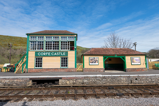 Corfe.Dorset.United Kingdom.April 17th 2023.Photo of Corfe Castle railway station in Dorset
