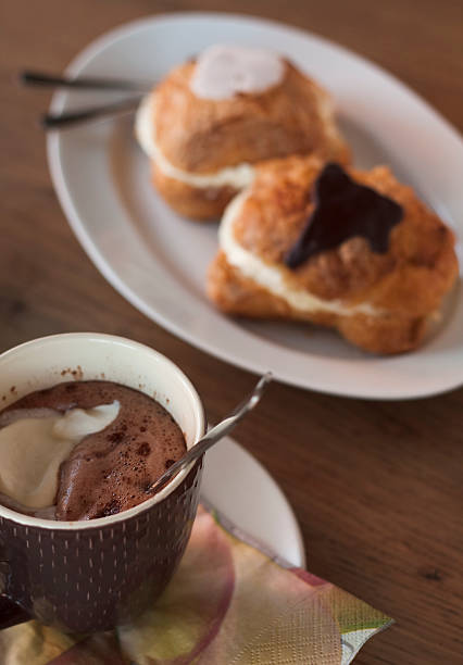 Hot Chocolate with Whipped Cream and Shrovetide buns stock photo