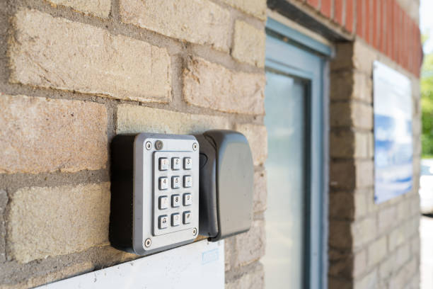 Shallow focus of a metal, electronic door entry keypad. stock photo