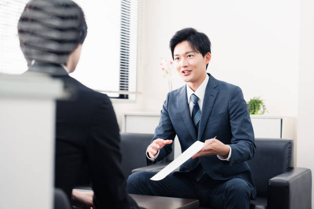 istock Businessman presenting documents at a business meeting 1525359356