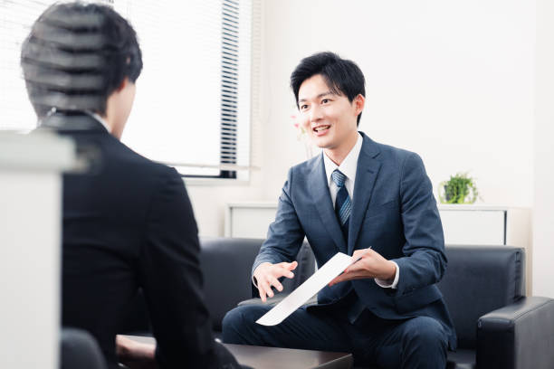 istock Businessman presenting documents at a business meeting 1525359357