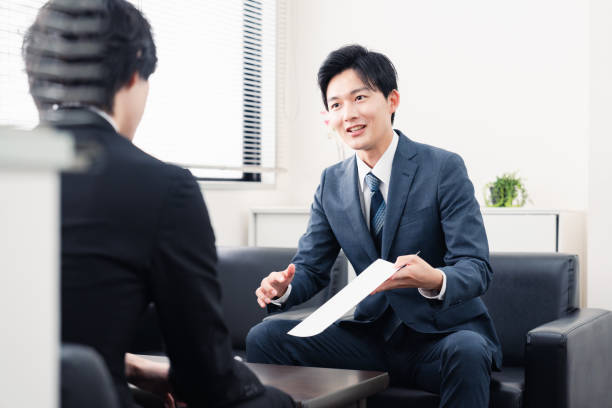 istock Businessman presenting documents at a business meeting 1525359358