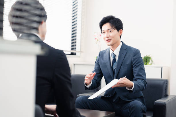 istock Businessman presenting documents at a business meeting 1525359360