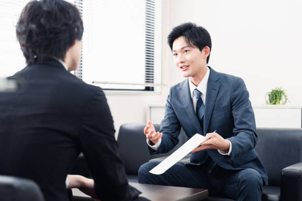 istock Businessman presenting documents at a business meeting 1525359361