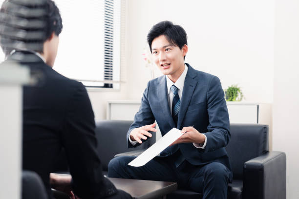 istock Businessman presenting documents at a business meeting 1525359363
