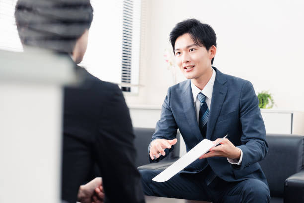 istock Businessman presenting documents at a business meeting 1525359367