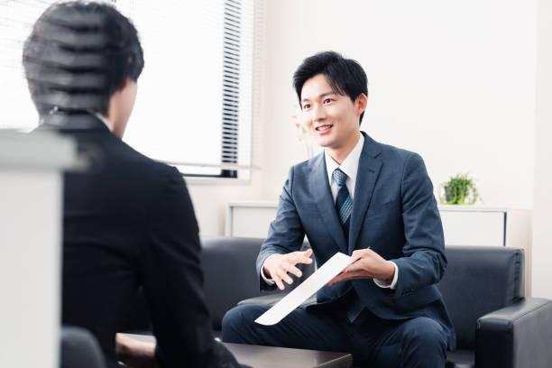 istock Businessman presenting documents at a business meeting 1525359371
