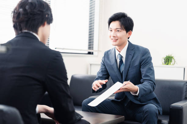 istock Businessman presenting documents at a business meeting 1525359373