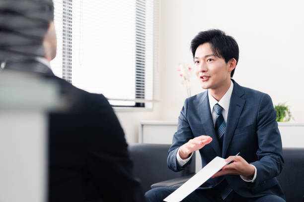 istock Businessman presenting documents at a business meeting 1525359374
