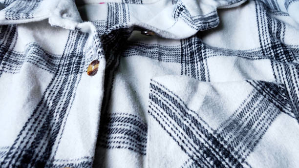 istock Checkered shirt background, clothes in store 1525362922