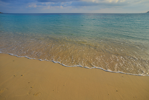 Yellow sand beach with blue sea in Con Dao Island, Southern Vietnam.