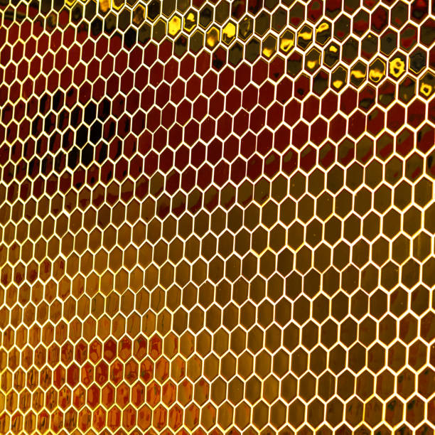 Tilt view of Golden wall with honeycomb pattern
