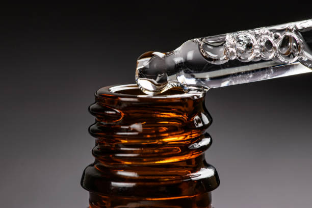 istock bottles and pipett with essential oil close up 1525365136