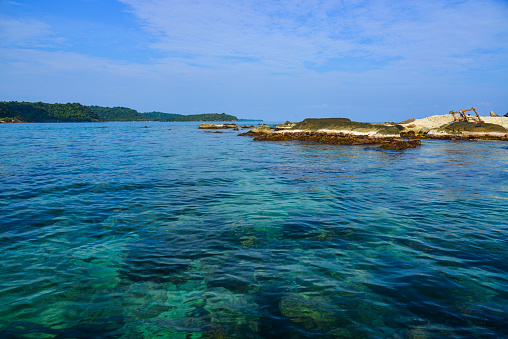 Turquoise water with rocks on sea in beautiful island.