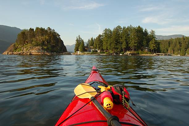 istock Red kayak on lake water forest 152536961
