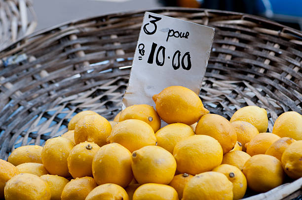 A basket of lemons on a market place in Port Louis at Mauritius Island.