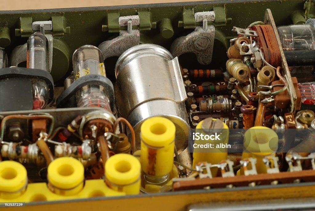vintage electronics interior of a vintage radio transmitter showing the different old and bulky components used Circuit Board Stock Photo